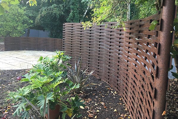 woven steel fence backdrop