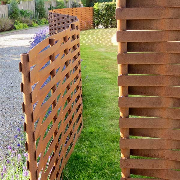 rusted weathered woven steel fencing for gardens